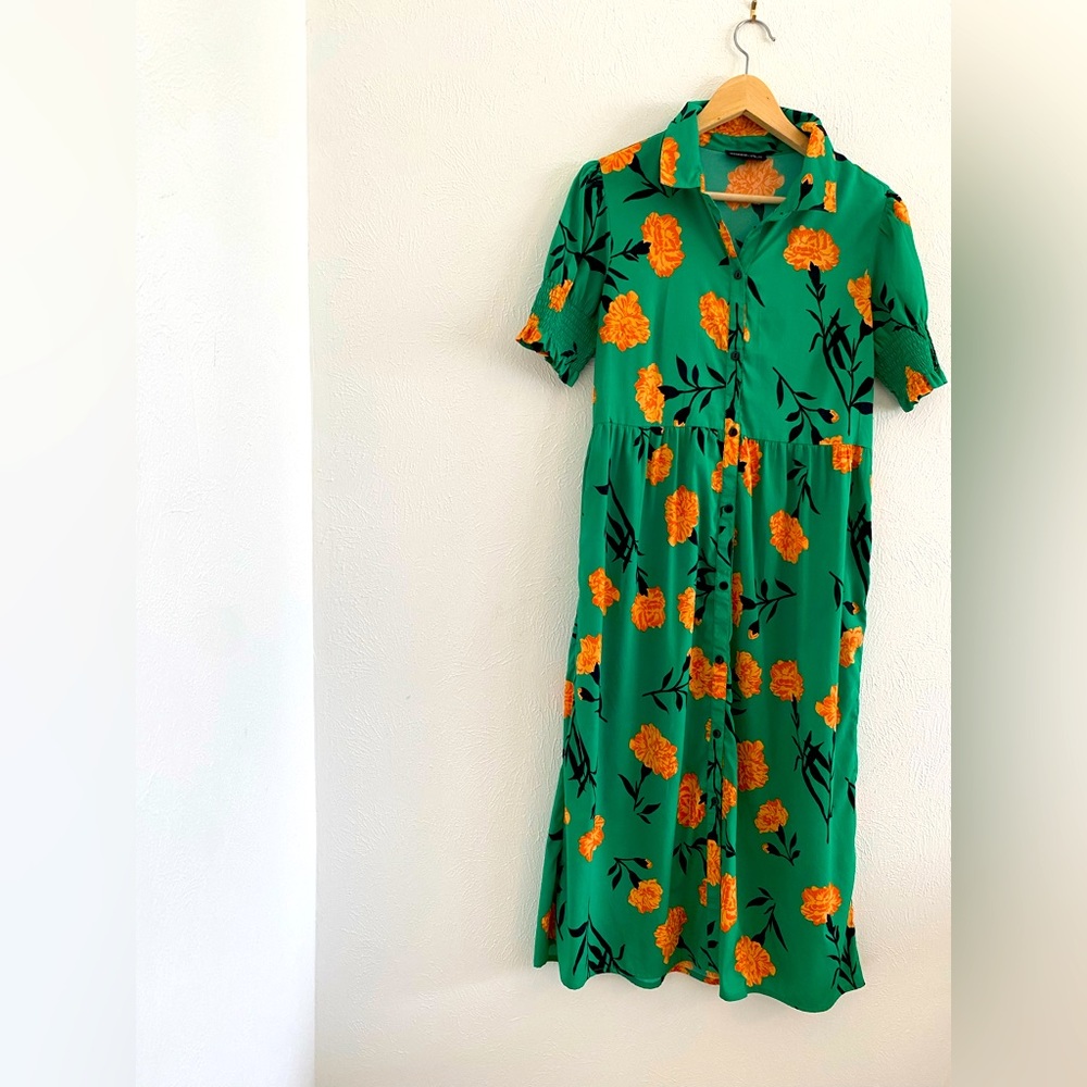 Wednesdays girl green dress.